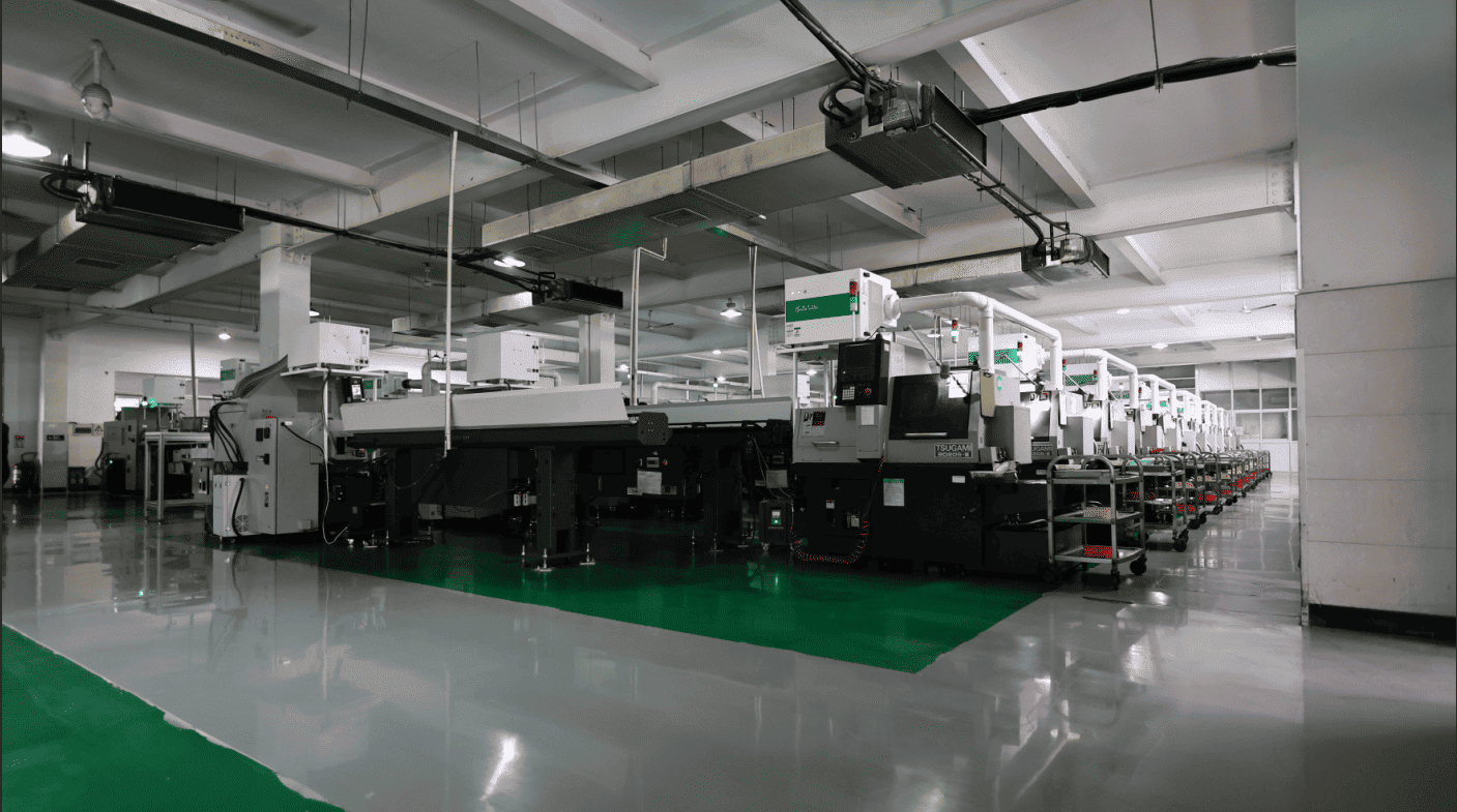 Swiss lathes are displayed in the NAITE TECH workshop