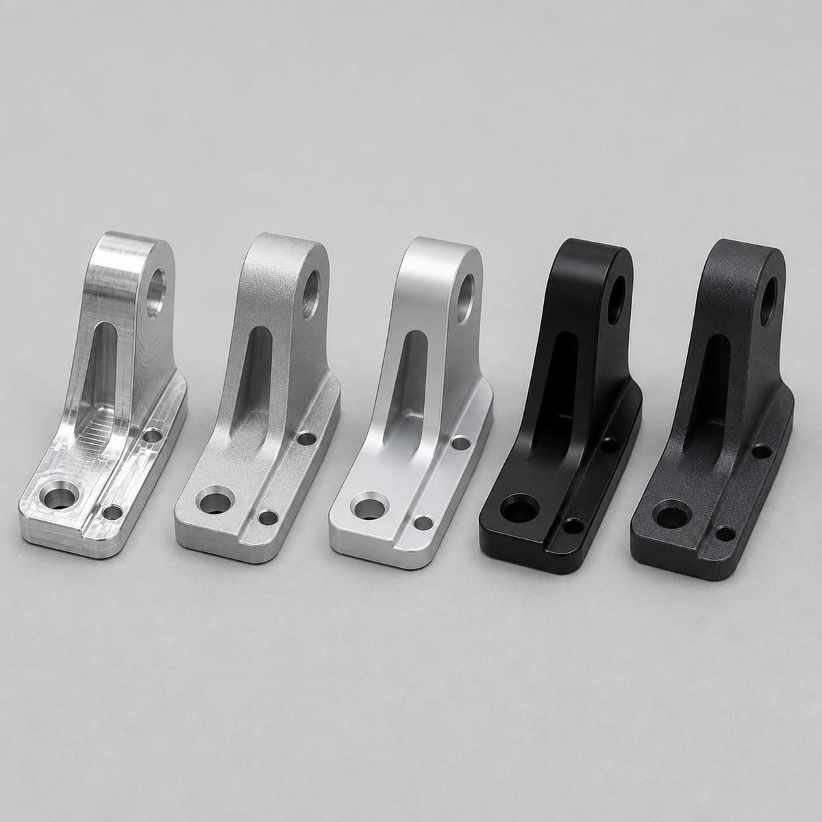 Aluminum parts with machined, bead-blasted, anodized and powder-coated surface finishes