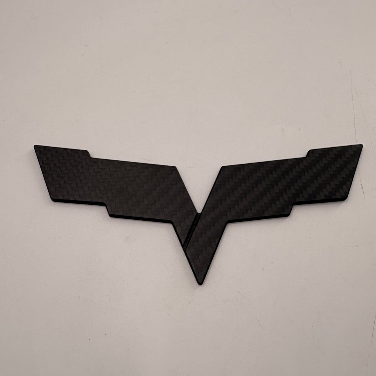 Finished matte T300 3K twill carbon fiber automotive emblem.jpg
