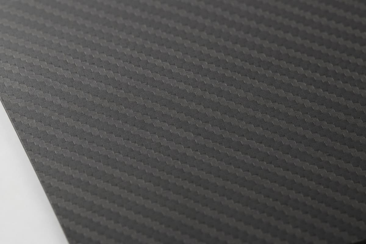 The matte 3K twill weave remained visible after the clear-coat finishing process.jpg